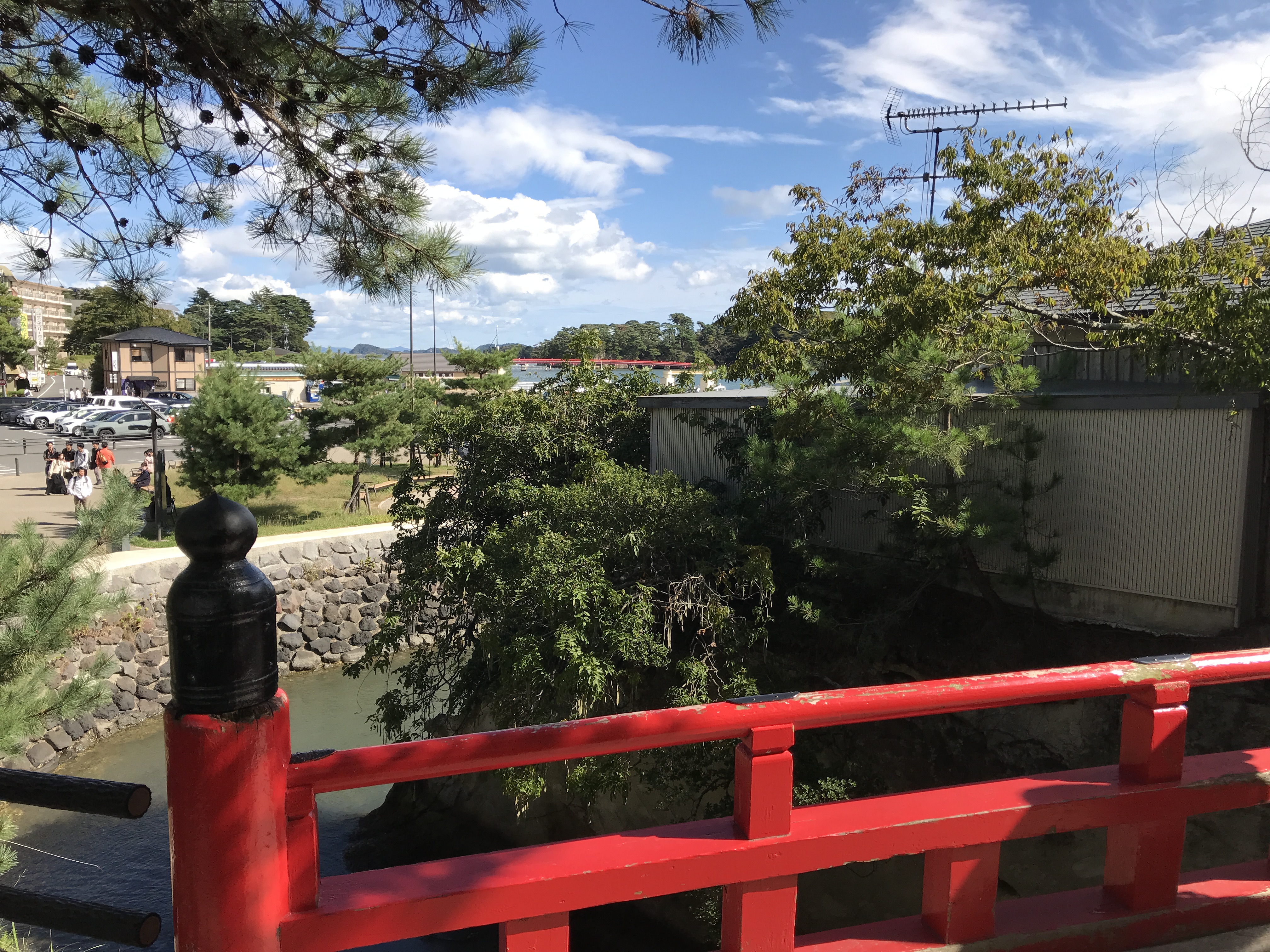 With another, much shorter, red bridge up close