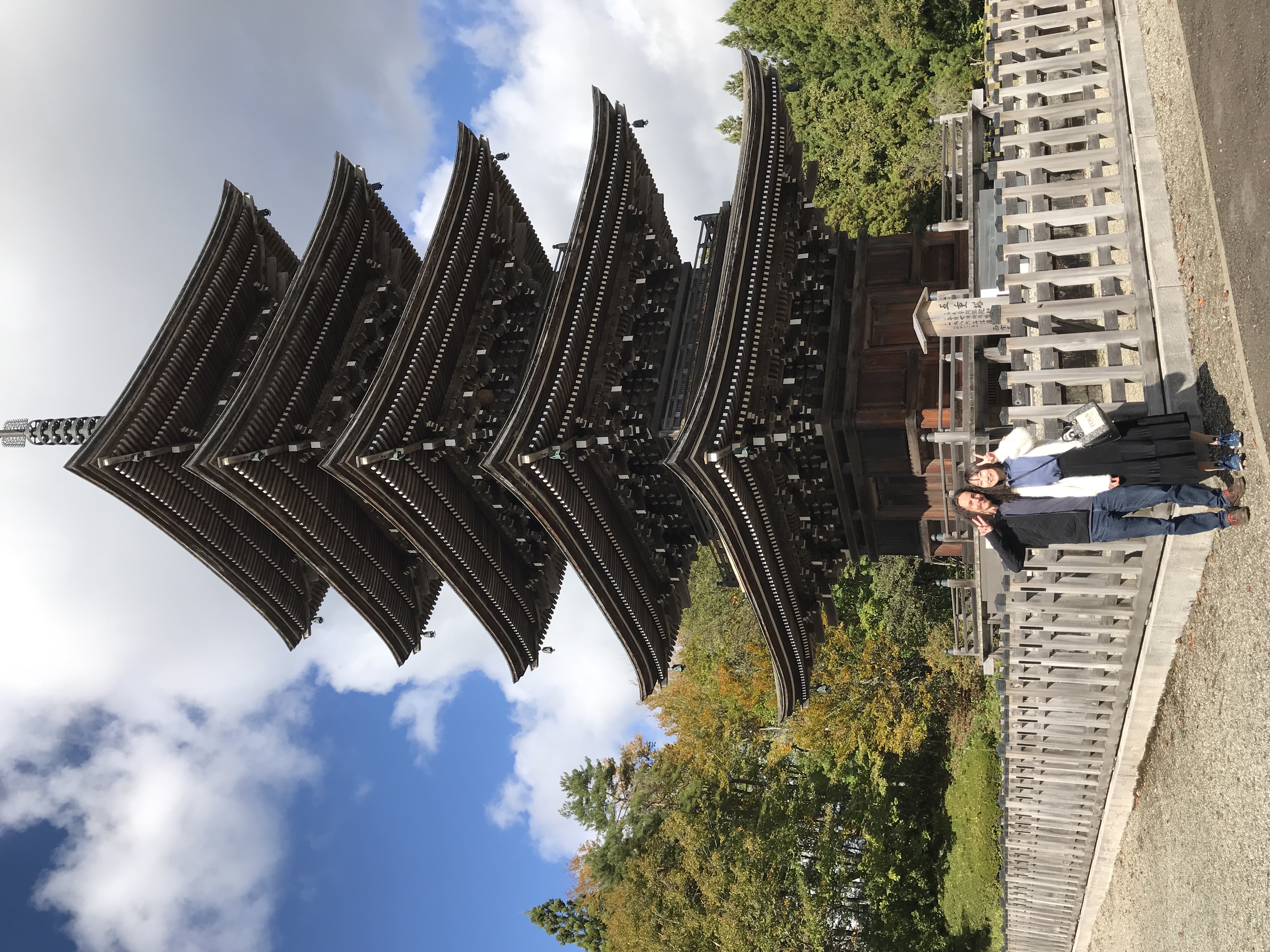 Look at that huge wasp nest up there on the third floor (American)